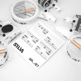 Photo of scale stickers that can be attached to compass