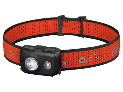 Main Image of head torch. Red strap with small headtorch with two bulbs on the front