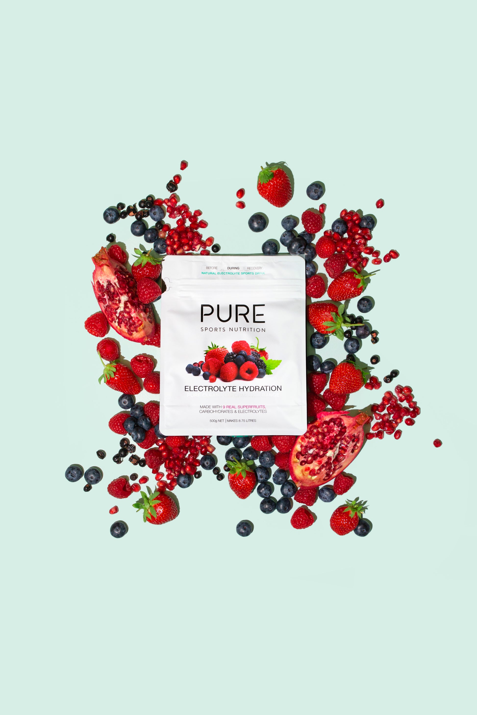 Product surounded by berries with a teal background