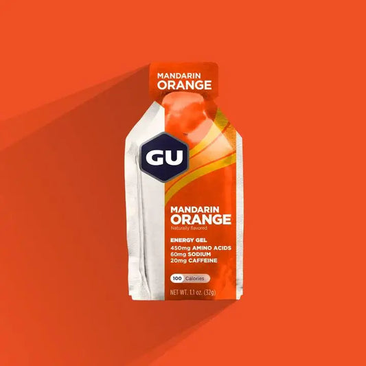 Product image of GU Energy Gel with an orange background