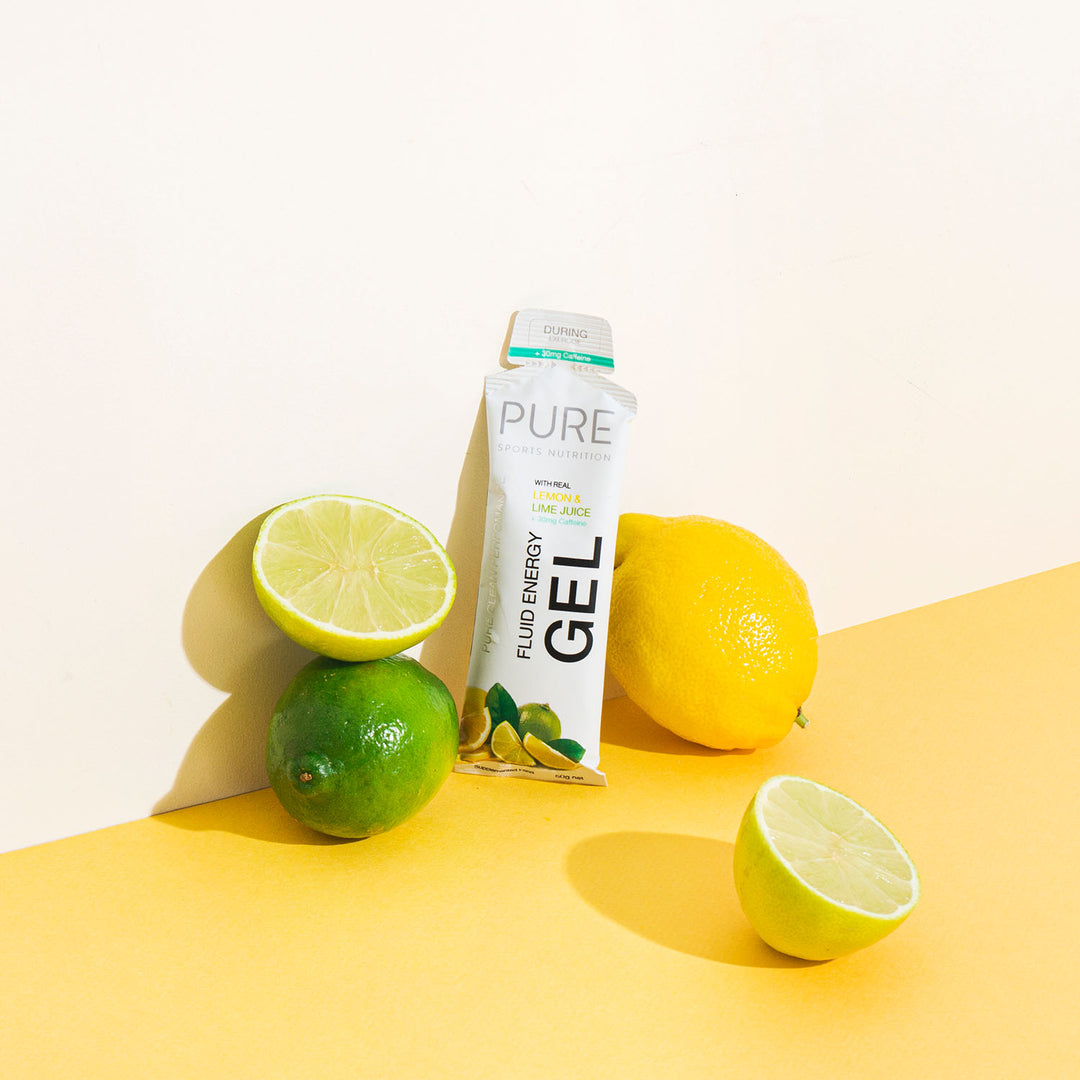 Product photo on yellow and pink background with lemon and limes