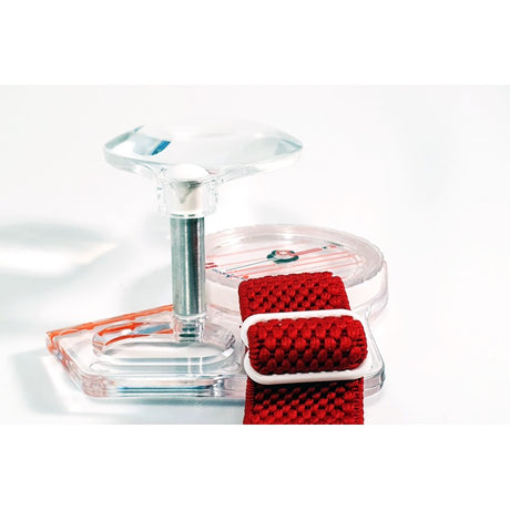 Orienteering magnifier attached to compass